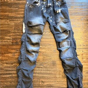 Distressed Blue Jeans with Paint Splatter